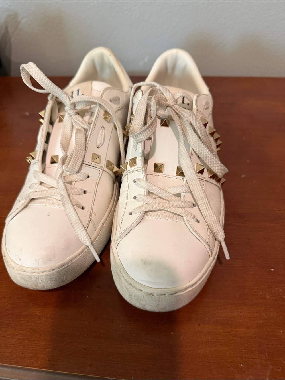 Valentino Cream Leather Lace-Up Sneakers with Gold Pyramid Studs